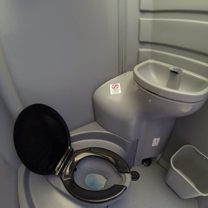 deluxe flushing porta potty with sink for rent